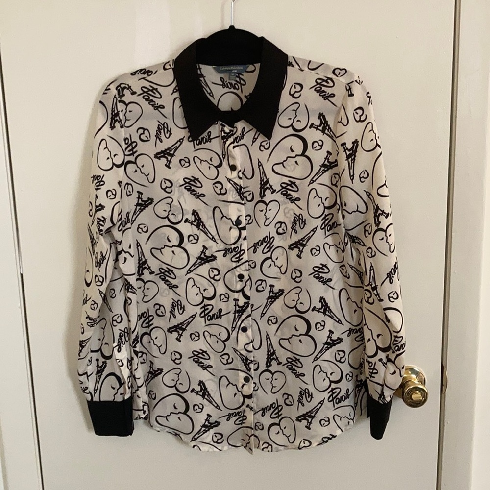 Black and cream patterned button-up shirt